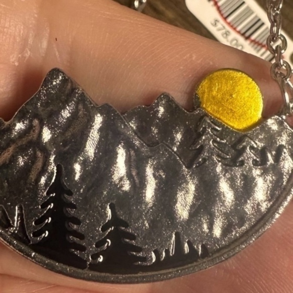 Intricately etched ,hand crafted Nature Eagle sunset mountain Necklace